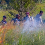 The fire takes hold on the edges of the paddock but does not burn into the centre due to the moisture content